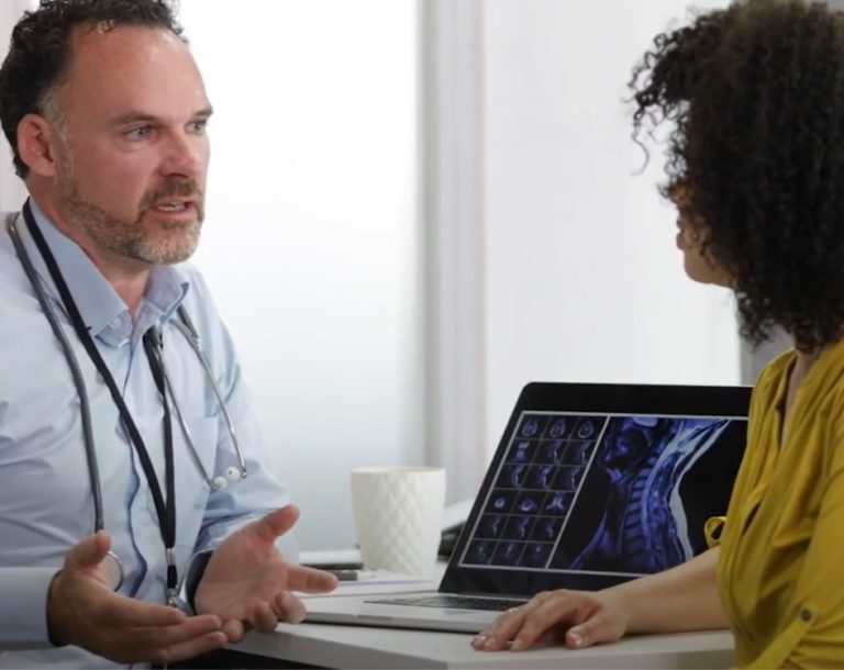 Doctor talking to patient